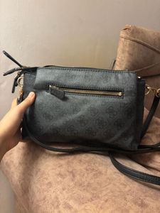 Guess Monogram Crossbody Bag