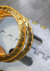Gold toned lakshmi roopu Bangles (Set of 2)
