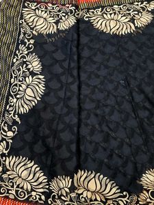 Elegant Black Saree with Floral Border