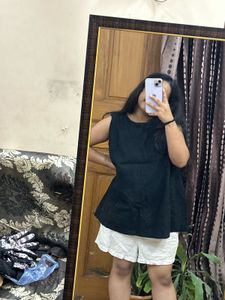 Chic Black Sleeveless Peplum Top