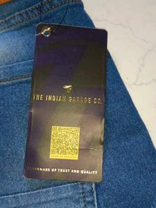 Stylish Men's Ripped Blue Jeans branded with tag