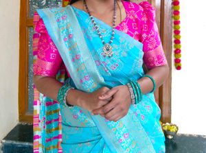pink blouse blue saree