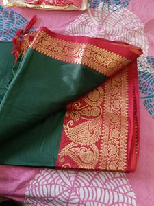 Elegant Green Saree with Gold Border