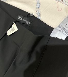Completely New Black Flare Pants with Side Slits