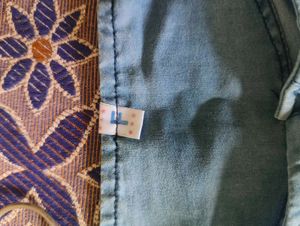 Soft Denim-Look Top with Elegant Floral Embroidery