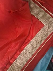 Elegant Red Saree with Gold Border