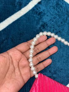 Elegant Pink Clutch with Pearl Strap