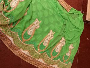 Vibrant lehenga Green Saree with Gold Border