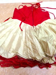 red  and beige colour frock