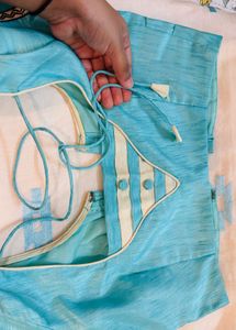 Cream Saree with Blue Embroidery blouse