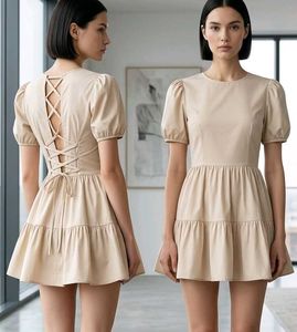 Chic Beige Lace-Up Back Mini Dress
