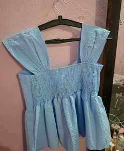 baby blue top