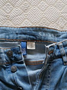 Distressed Light Wash Denim Jeans