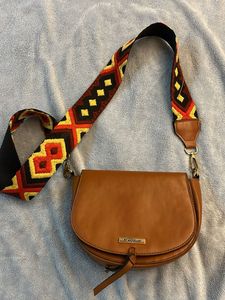 Stylish Brown Crossbody Bag with Embellished Strap