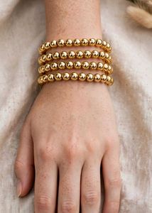 Set of 4 Gold Beaded Bracelets