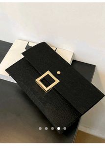 Elegant Black Clutch with Gold Buckle