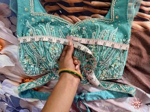 Stunning Teal Embellished Lehenga Choli