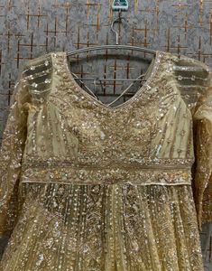 Stunning Gold Embellished Lehenga Choli