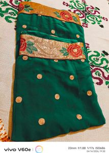 Elegant Emerald Green Saree with Gold Border