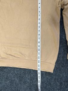 beige sweatshirt