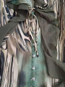 ruffle green button up shirt