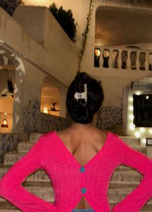 Trendy Pink Off-Shoulder Top with Button Detail