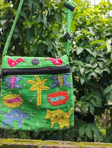 Vibrant Embroidered Sling Bag