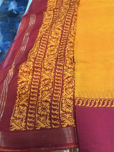 Vibrant Orange Saree with Maroon Border