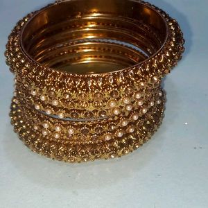 Elegant Gold Bangles with Pearl Embellishments