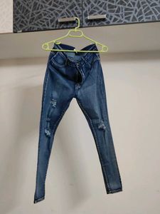 Distressed Blue Denim Jeans