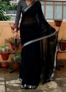 Mesmerizing Black With Silver Border And Tassels.