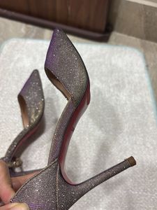 shiny pair of stelletoes