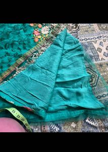 Elegant Teal Kurta Set with Intricate Embroidery