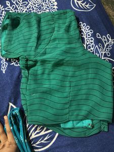 Elegant Green Saree with Black Floral Print