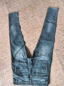 Distressed Blue Denim Jeans