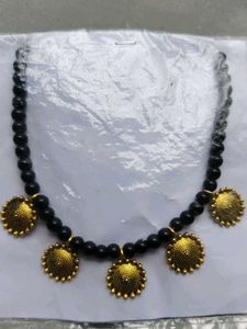 Black Beaded Necklace with Gold Pendants