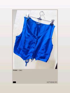 Vibrant Blue Sleeveless Button-Up Blouse