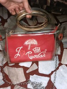 Unique Transparent Clutch with pink Pouch