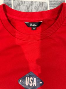 Red "Surf Paradise" sweatshirt