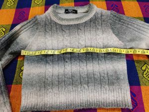 Stylish grey and white sweater