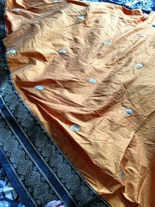 Orange Lehenga Choli with Embellishments
