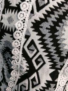 White top with black pattern
