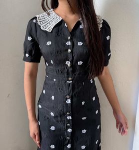 imported Chic Black Floral Midi Dress