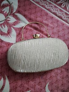 Sparkly Oval Clutch Bag