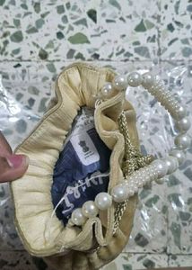 Elegant Pearl Embellished Drawstring Potli Bag