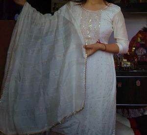Elegant White Kurta Set with Embellished Neckline