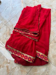 Elegant Red Saree with Embroidered Border