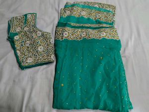 Elegant Teal Embroidered Saree...
