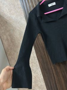 Chic Black Ribbed Bell Sleeve Top