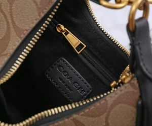 Coach Signature Pattern Hobo Bag